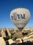 Royal ballons flying in the sunrise light in Cappadocia, Turkey above the Fairy ChimneysÂ rock formationÂ nearby Goreme